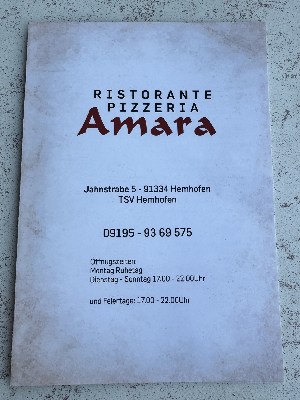 Titelblatt der To-Go-Karte des Restaurant Pizzeria Amara